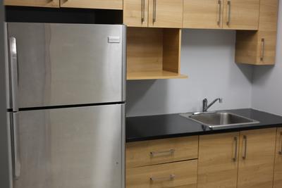 Full kitchenette with stainless steel appliances