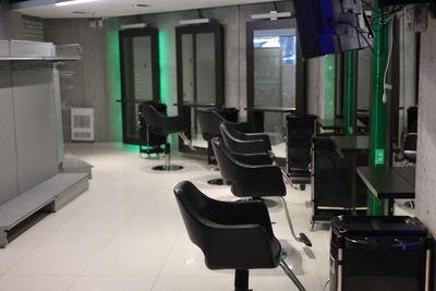 Waiting area with electric fireplace and leather seating